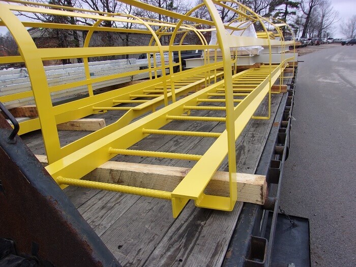 caged ladder on trailer