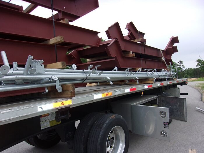 Two rows of stacked stairs on a trailer