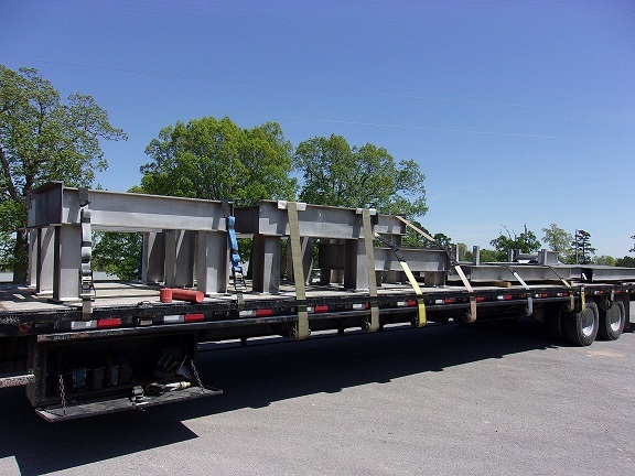 metal strapped to a trailer